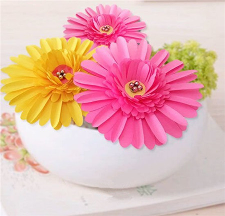 彩紙立體太陽(yáng)菊花朵制作方法5